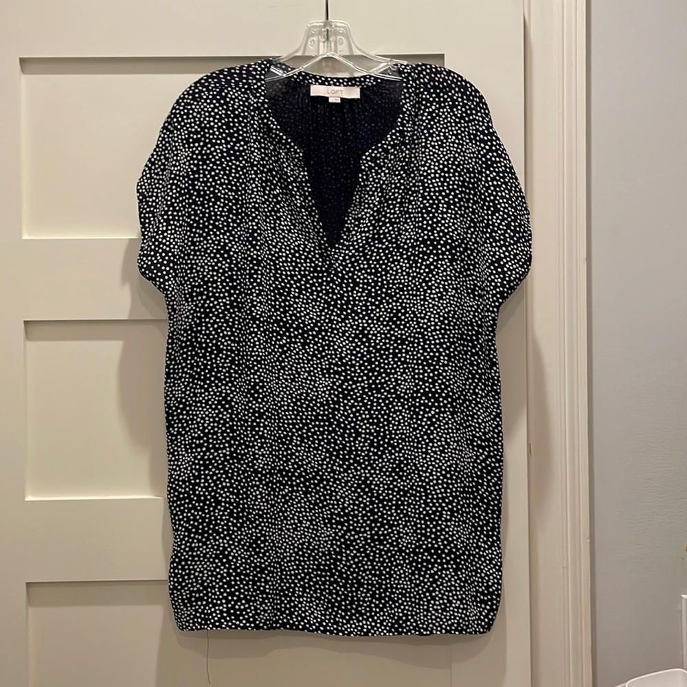 Navy top with white dots.